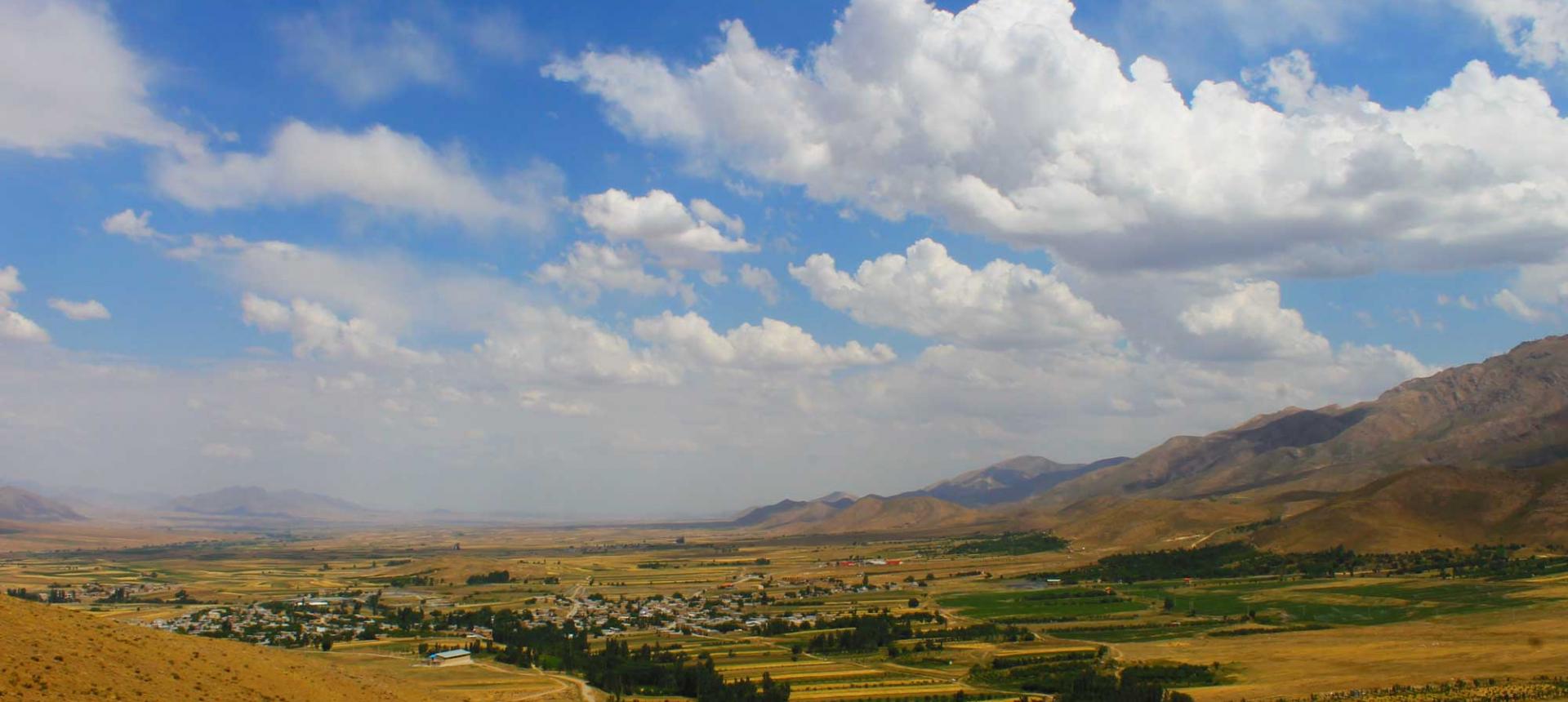 Valley scene with sky and clouds