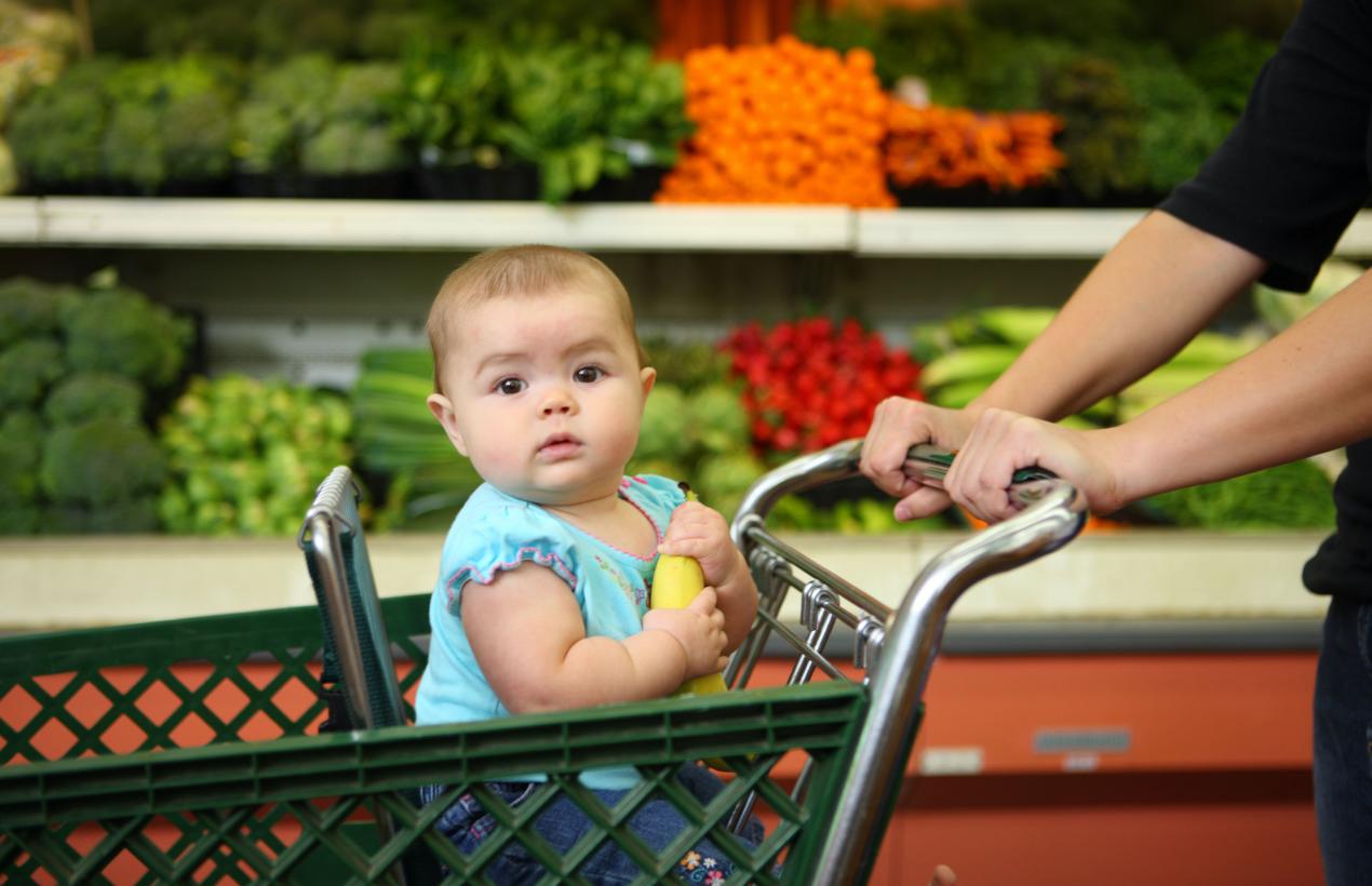 Image of baby in shopping cart